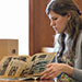 Student looking through archives
